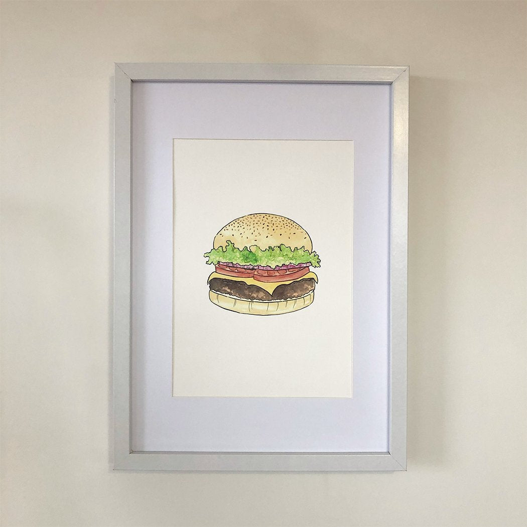 Hamburger watercolour print. Available in 2 sizes which are A4 and A3. A4 pictured here. Frame not included.